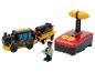 Train jouet noir et jaune avec télécommande et figurine