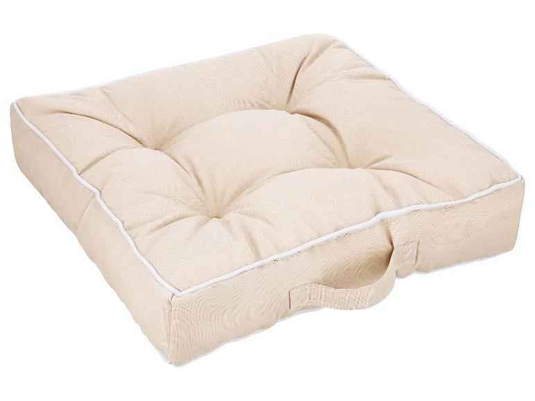 Beige vierkant zitkussen met handvat en witte bies.