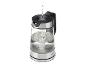 Transparante glazen waterkoker met ingeschonken water en bubbels.