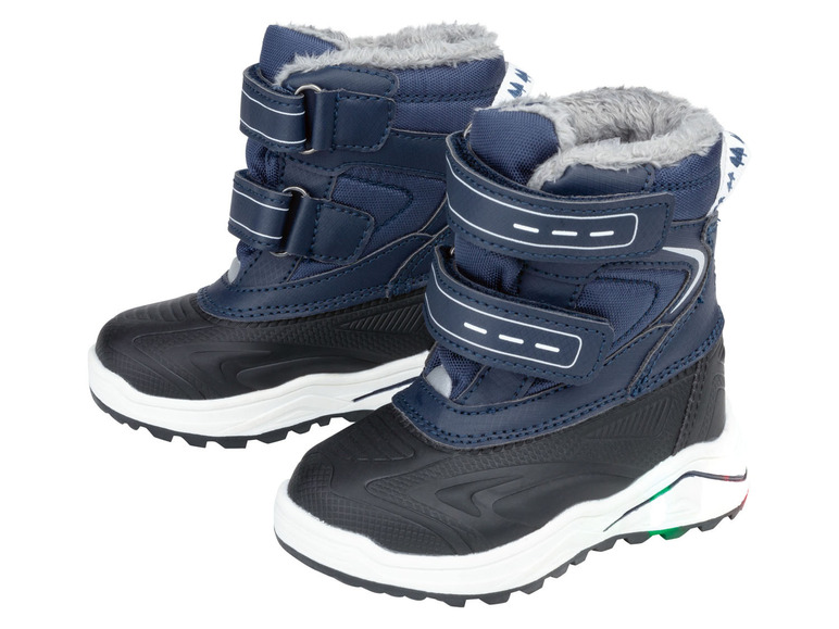 Twee paar blauwe kinderschoenen met klittenband.