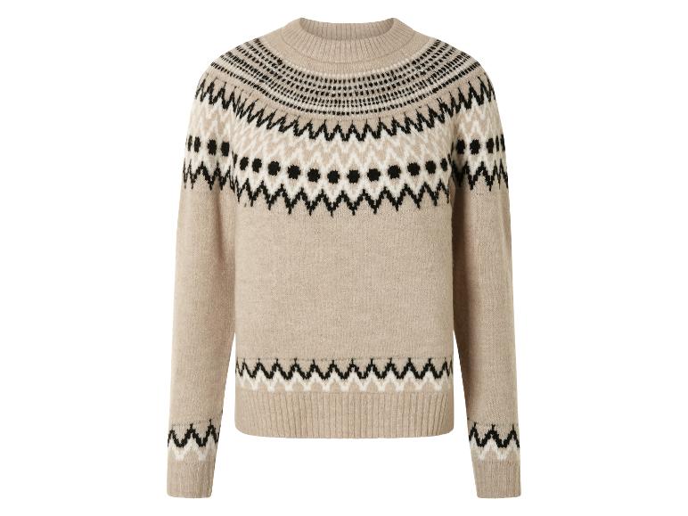 Pull en maille beige avec un motif géométrique noir et blanc.