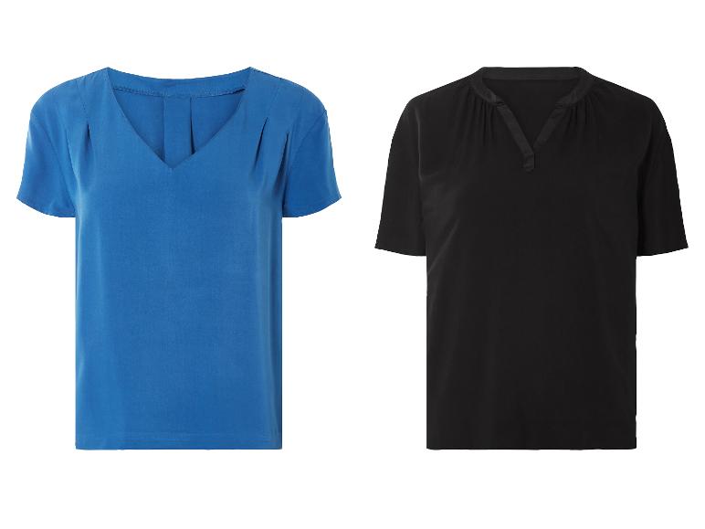 Korte mouw blouses: een blauwe en een zwarte.