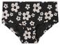 Zwarte slip met witte bloemenprint.