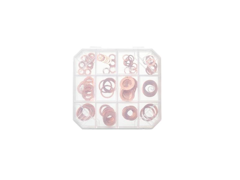 Assortiment koperen ringen in een transparante opbergdoos