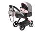 Een roze en grijze kinderwagen met een unicorn-print.