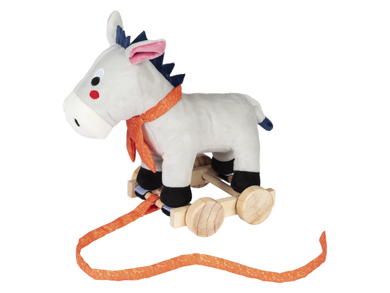 Een grijze pluche ezel op houten wielen met een oranje trekkoord.
