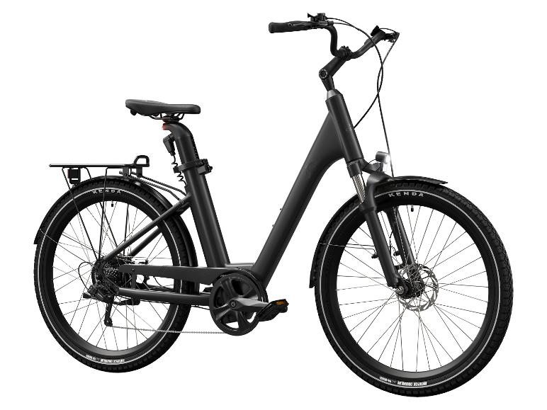 Un vélo électrique noir avec des pneus Kenda.