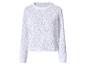 Pull en maille blanc à manches longues avec motif losanges.