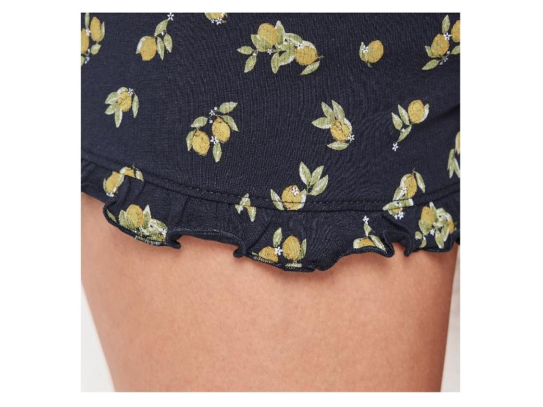 Shorts en jersey noir à volants, motif citron.