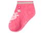 Chaussette enfant rose avec motif de cochon et fleurs.