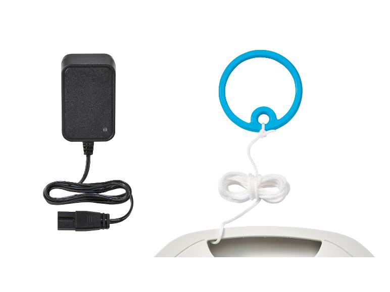 Stroom adapter, koord en blauwe ring voor apparaat.