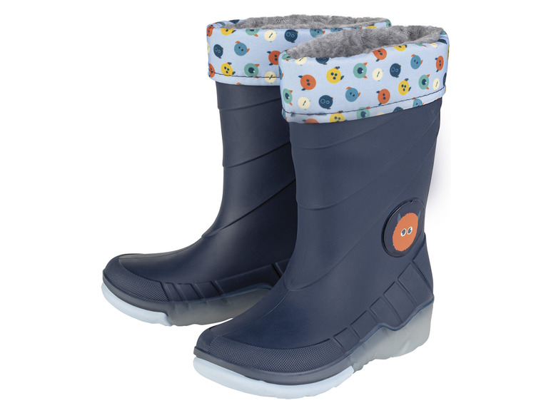 Bottes de pluie bleues avec un motif de boutons