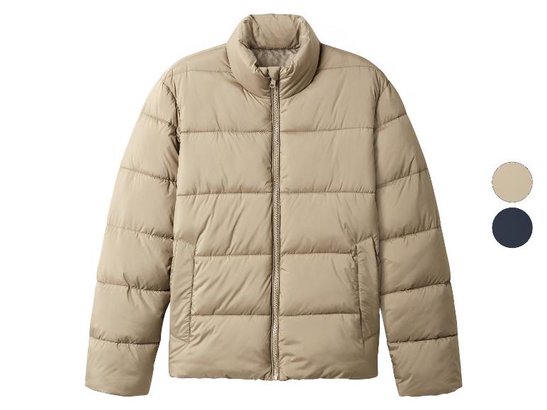 Een beige pufferjack met rits en twee kleurstaaltjes.