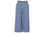 Blauwe wijde broek met bloemenprint.