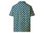 Chemise bleue à manches courtes avec un motif répété de cercles jaunes et de grille blanche.