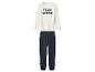 Wit shirt met lange mouwen met 'TEAM VALENTINE' tekst en donkerblauwe broek.