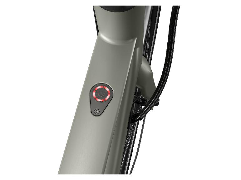 Een grijs elektrische fiets met een rode aan/uitknop.