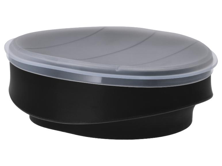 Zwarte siliconen container met doorschijnend plastic deksel, ideaal voor opslag.