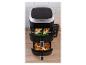 Dubbele airfryer met kip, sperziebonen, friet en kippenvleugels.