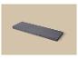 Matelas pliant gris à trois sections sur fond beige.