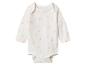 Body bébé blanc à manches longues avec motif marguerites roses