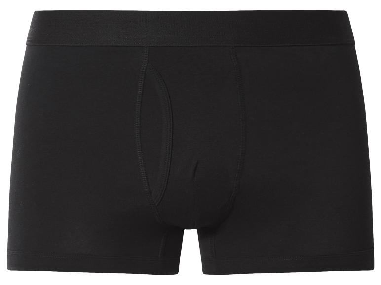 Caleçon boxer noir pour homme avec ceinture élastique.