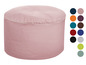 Een roze ronde poef met verschillende kleuren opties.