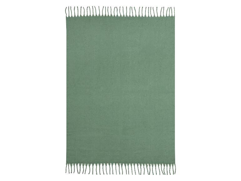 Groene deken met franjes