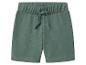 Shorts en jersey vert avec taille élastique et cordon de serrage.