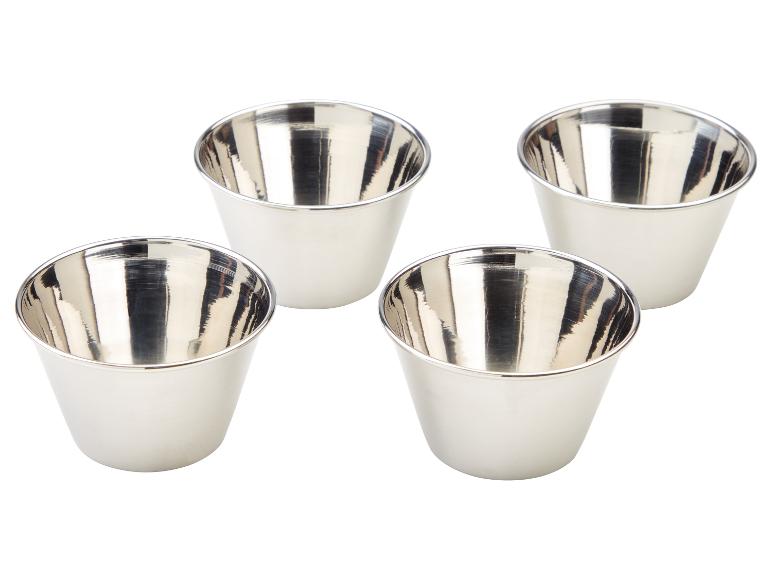 Vier zilveren bakjes voor het serveren van sauzen of desserts.