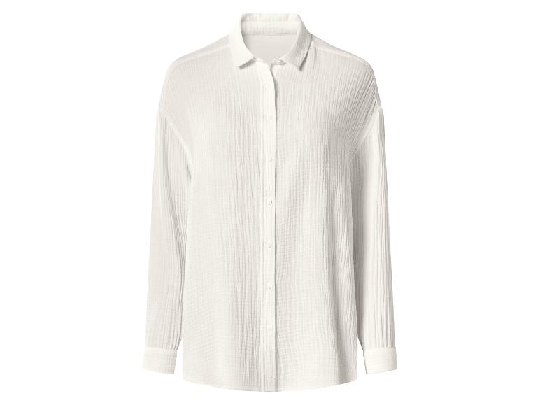Chemise femme écru à manches longues avec une texture froissée.