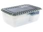 Transparante opbergbox met meerdere stapelbare bakjes.