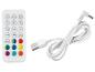 Télécommande blanche avec boutons colorés et câble de chargement USB.