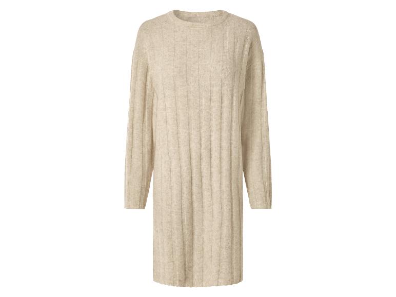 Beige geribbelde trui-jurk met lange mouwen.