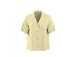Chemise de pyjama jaune clair avec passepoil blanc et manches courtes.