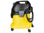 Un aspirateur jaune avec un cordon noir et des roues.