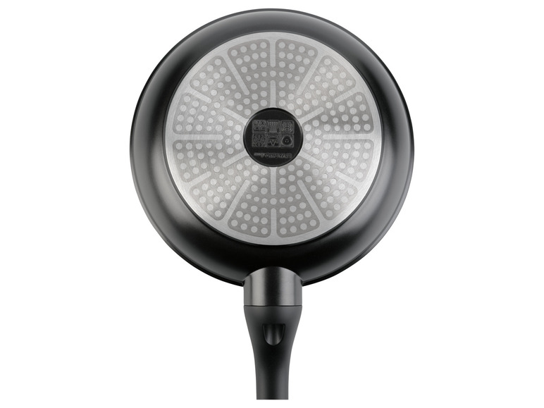 Une poêle noire de la marque Livarno, vue du dessous.