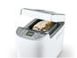 Een broodbakmachine met een versgebakken brood er in.