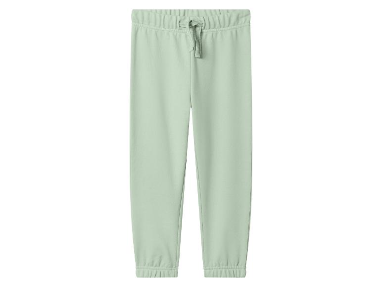 Pantalon de jogging vert clair avec cordon de serrage à la taille.