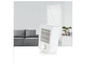 Un radiateur électrique blanc avec une grille.