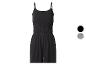 Zwarte korte jumpsuit met spaghettibandjes en elastische taille, effen en met patroon.