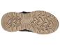 Semelle extérieure d'une chaussure de randonnée marron et noire avec un motif robuste
