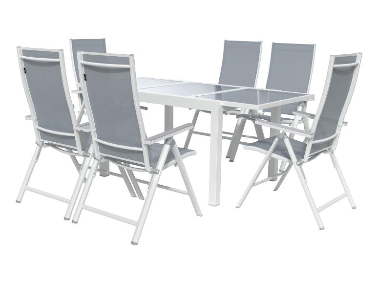 Witte tuintafel met grijze stoelen, buiteneetset.