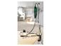 Multifunctioneel gereedschap met flexibele as en accessoires op een houten tafel.