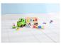 Peppa Pig houten speelgoed met een vrachtwagen, aanhanger en vormsorteerder op een witte houten vloer.