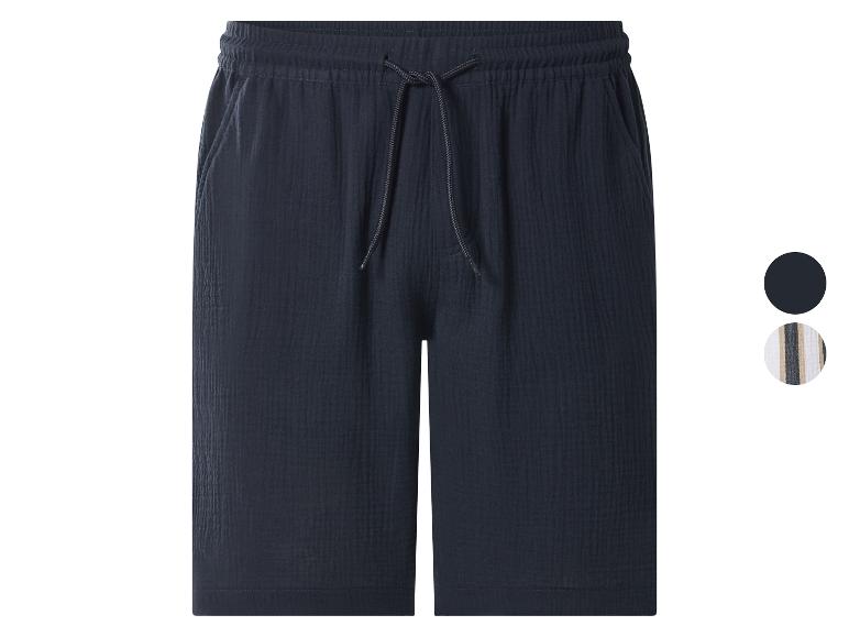 Donkerblauwe katoenen shorts met verstelbaar trekkoord.