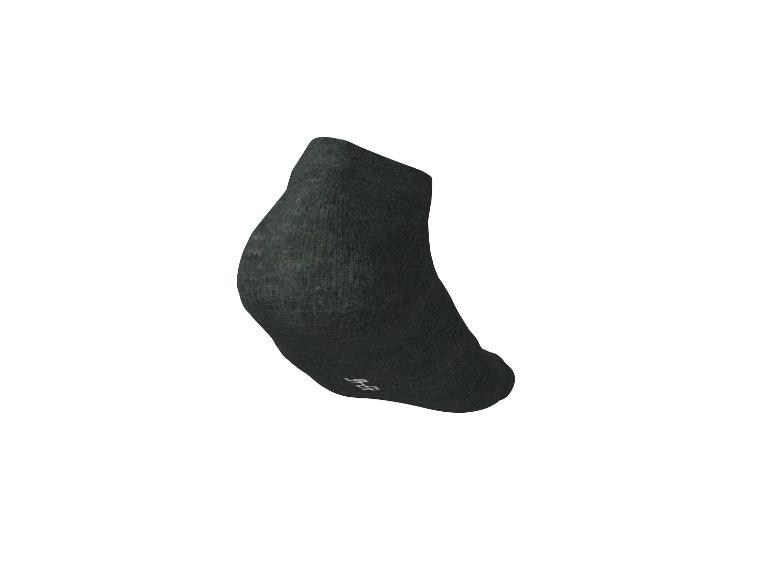 Chaussette de sport gris foncé avec inscription blanche sur la semelle.