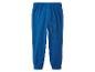 Pantalon de survêtement bleu avec taille et poignets élastiques.