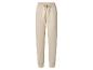 Pantalon de survêtement beige avec taille élastique et cordon de serrage.
