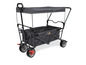Un chariot pliable gris avec un auvent.